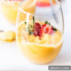 Tropical Mango Coconut Cheesecake Parfaits 5 Mango Coconut Cheesecake Parfaits in a glass