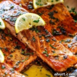 Pan-Seared Salmon with Zesty Lemon Garlic Butter 5 Pan Seared Salmon with Lemon Garlic Butter Sauce with lemon wedges