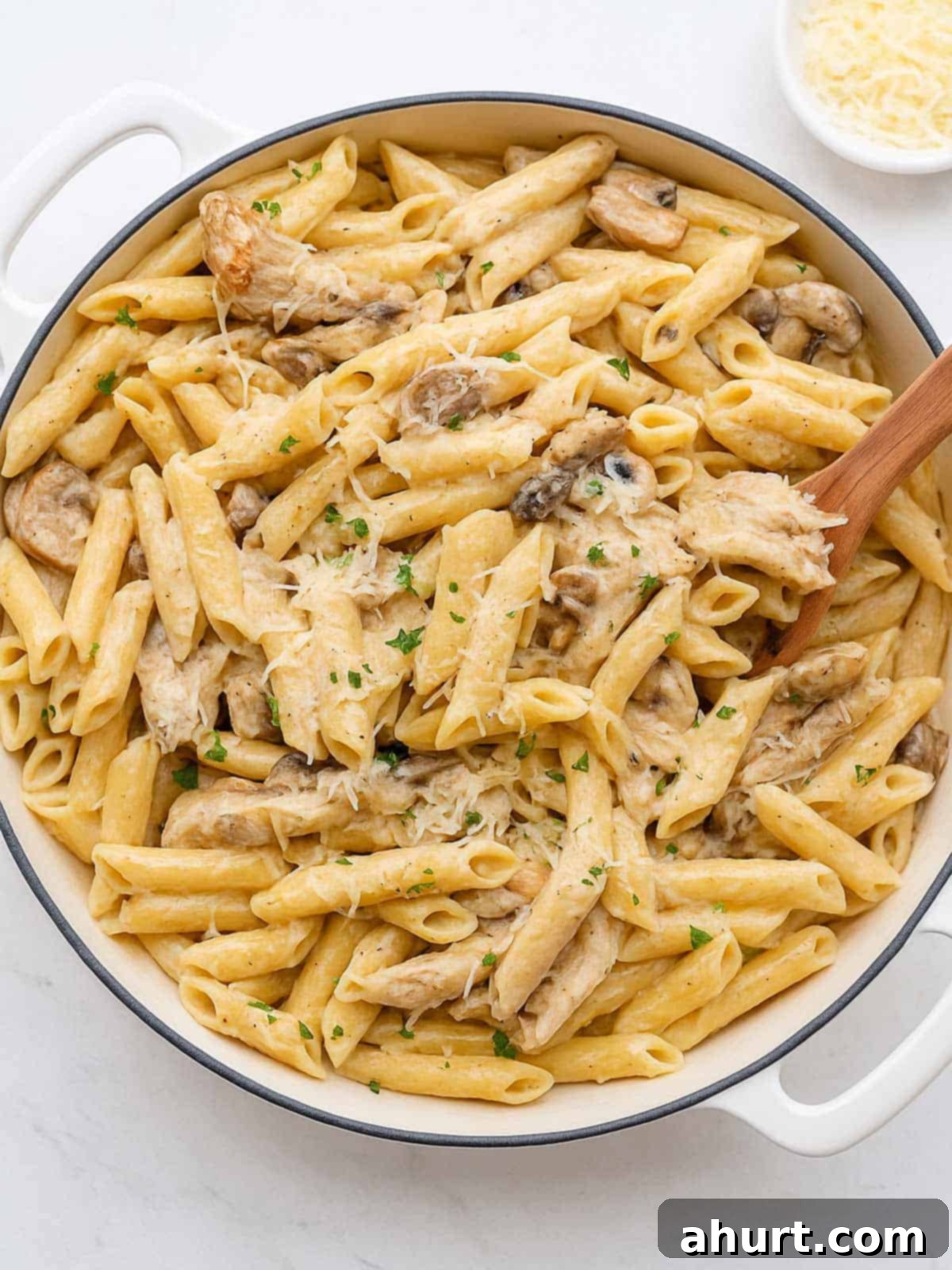 One-Pot Creamy Mushroom Chicken Pasta 2 Seared chicken strips mixed through this One-Pot Creamy Mushroom Chicken Pasta, with garlic, mushrooms and parmesan cheese. The pasta is sprinkled with freshly grated parmesan and fresh herbs.