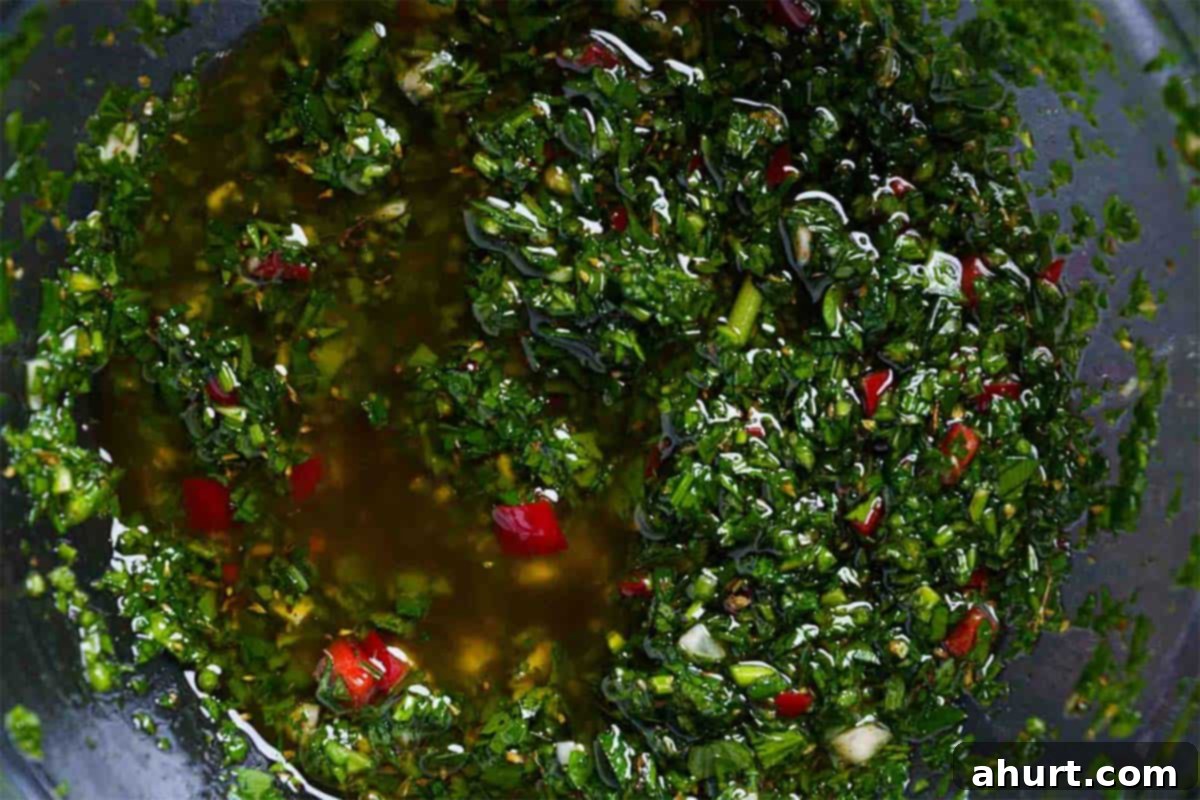 The Authentic Chimichurri of Uruguay and Argentina 6 Image of the mixture of ingredients being left to sit so that the flavors meld together for the best results.