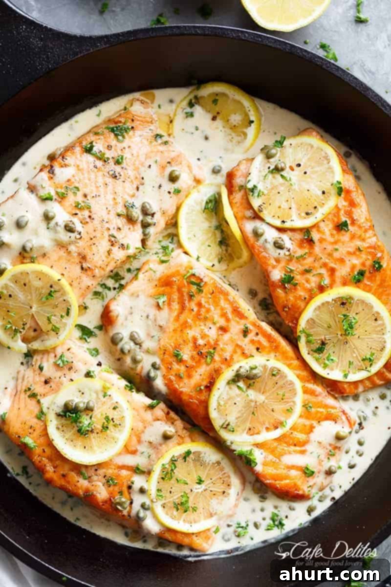 Velvety Salmon Piccata 2 Creamy Lemon Garlic Salmon Piccata on a platter is a classy yet easy salmon recipe you've been waiting for, with a delicious creamy lemon caper sauce!