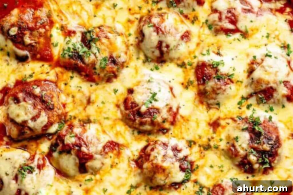Irresistible Cheesy Meatballs 11 Return meatballs and any juices to the sauce, cover, and cook 20 minutes and top with mozzarella cheese.