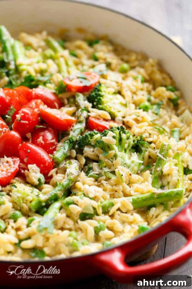 One-Pan Spring Orzo 3 Zoom in image of One Pot Orzo Primavera is full of green vegetables and a beautiful sauce with a hint of cream, garlic and lemon!