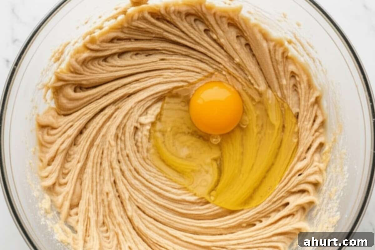 Pillowy Peanut Butter Bliss 6 add egg to the batter until light and fluffy.
