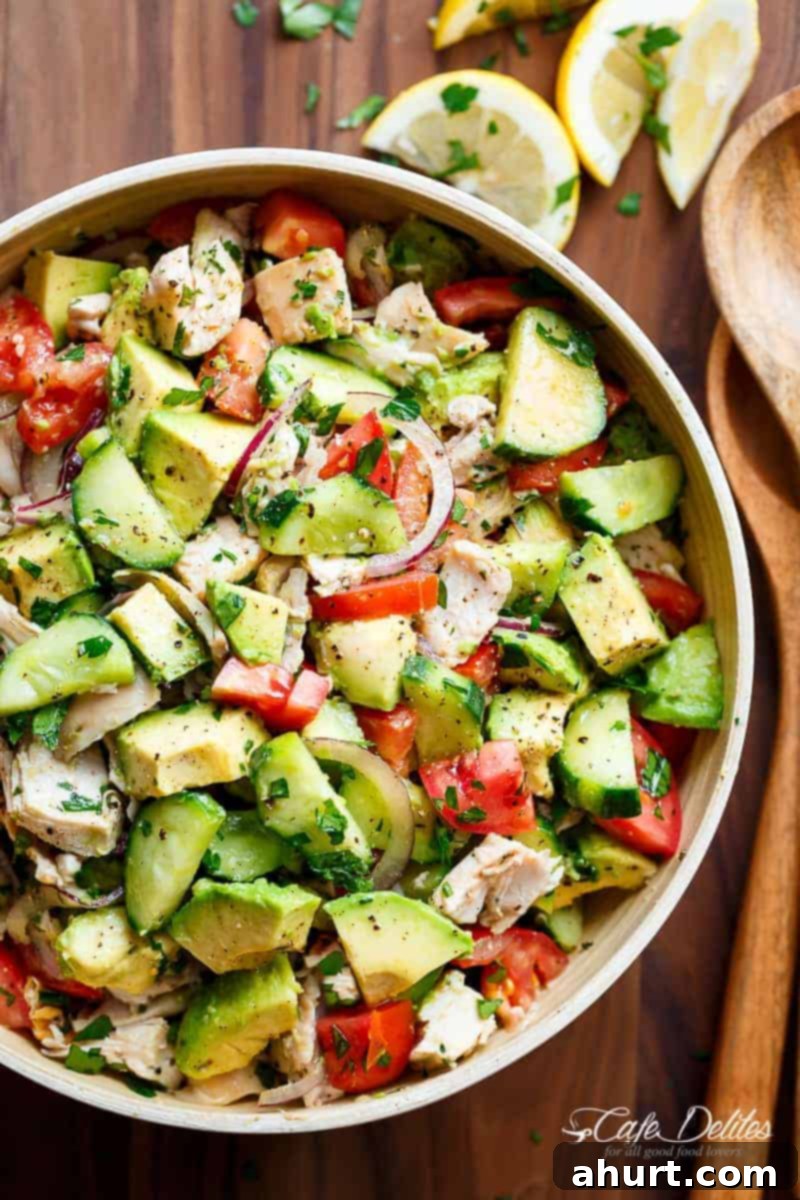 No-Cook Chicken Avocado Cucumber Salad 2 Quick And Simple Chicken Cucumber Avocado Salad in a bowl, showcasing fresh ingredients