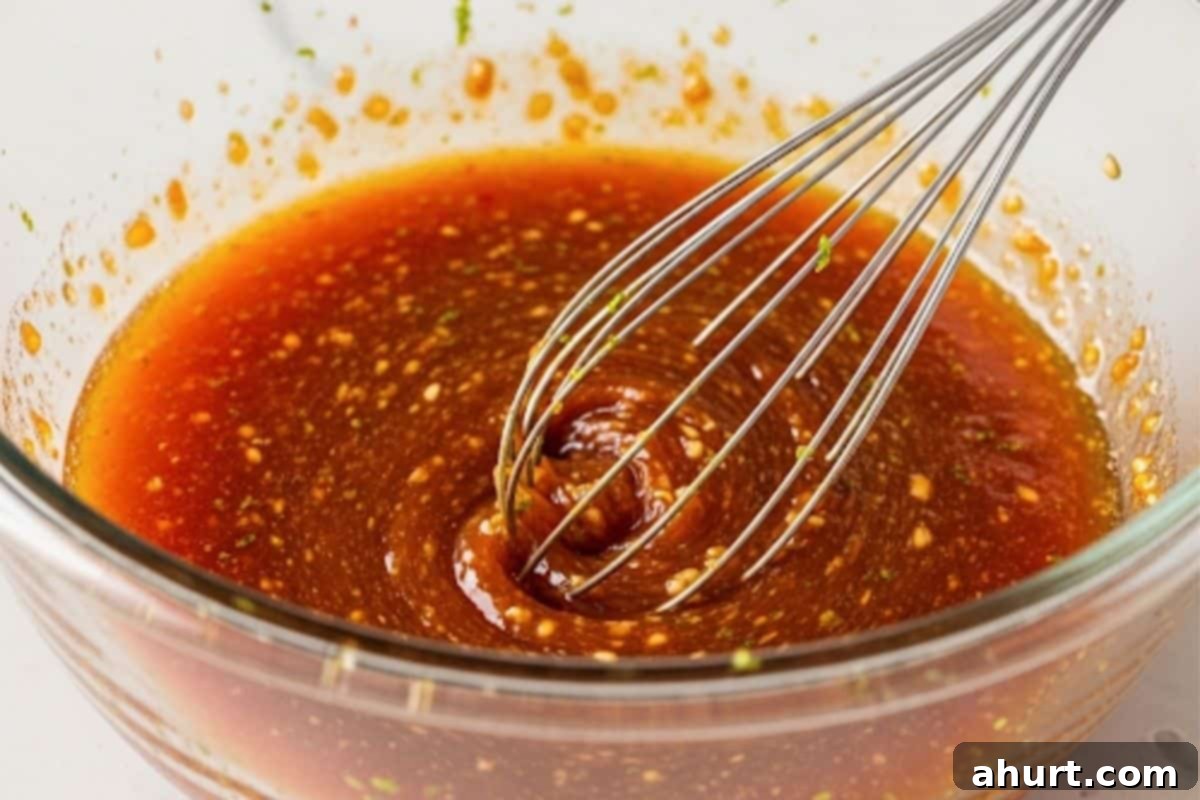 Honey Sriracha Glazed Chicken 4 In a bowl, whisk honey, sriracha sauce, garlic, rice wine vinegar, soy sauce and lime juice until combined.
