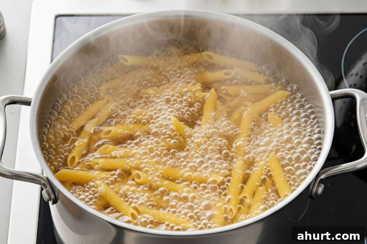 Zesty Mediterranean Pasta Salad 4 Penne in a large pot of boiling water.