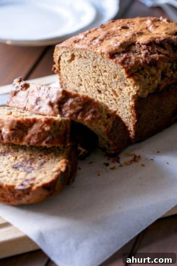 Peanut Butter Chocolate Chip Banana Bread slices with topping