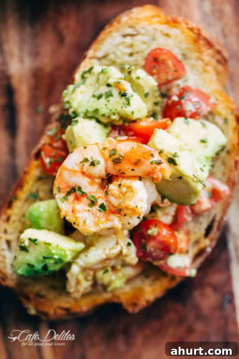 Zesty Shrimp Avocado Garlic Toast 4 Long view image of Shrimp Avocado Garlic on avocado garlic bread