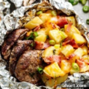 Garlic Butter Steak and Potatoes 4 Top view of Steak & Cheesy Bacon Potato Hash Foil Packs