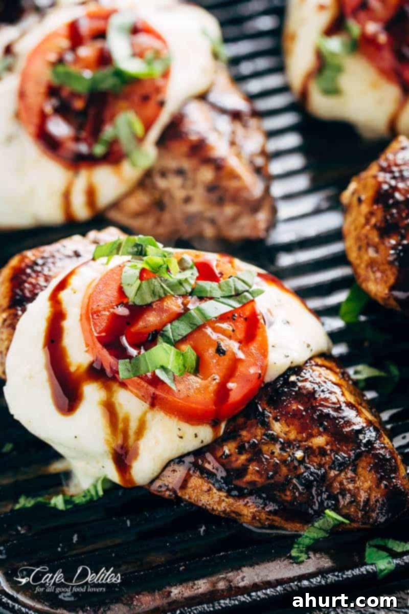 Buffalo Mozzarella Grilled Chicken Caprese 2 Zoom in image of Grilled Chicken Caprese pieces, with soft, creamy Buffalo Mozzarella slices