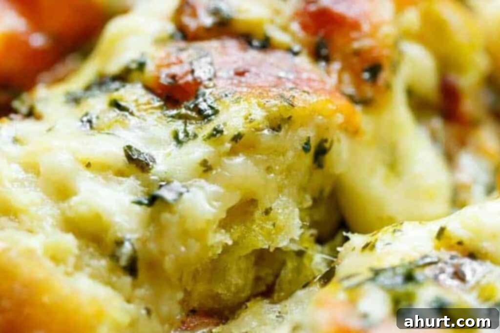 Foolproof Gooey Garlic Cheese Bread 7 Step 4: Baked and broiled Cheesy Garlic Bread, sliced and ready to serve