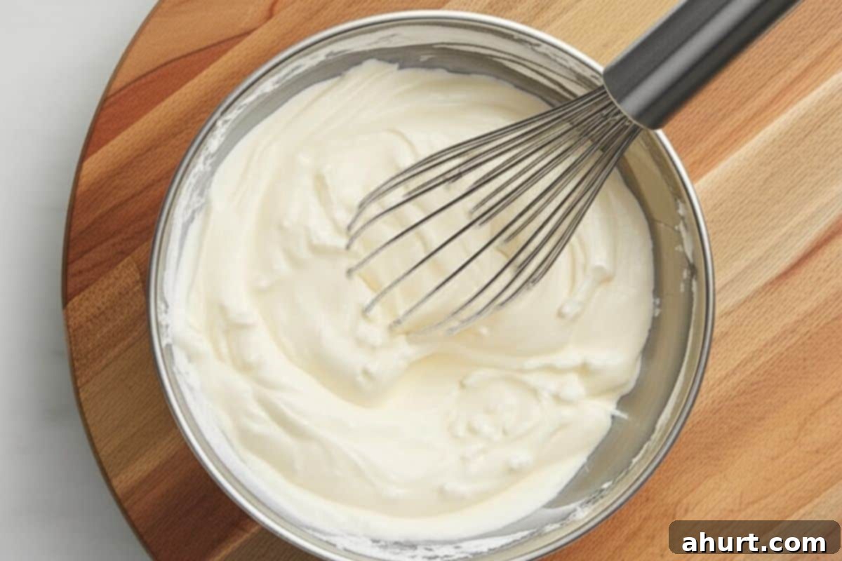 Tangy Bacon Dill Potato Salad 5 In a separate bowl, whisk together mayonnaise, sour cream, white vinegar, Dijon mustard, fresh dill, salt, and pepper until smooth.