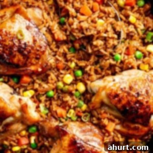 One-Pan Sticky Asian Chicken and Rice 4 One Pan Asian Chicken and Rice equals crispy skinned chicken full of incredible Chinese-inspired flavours sits on top of a fried rice inspired skillet!
