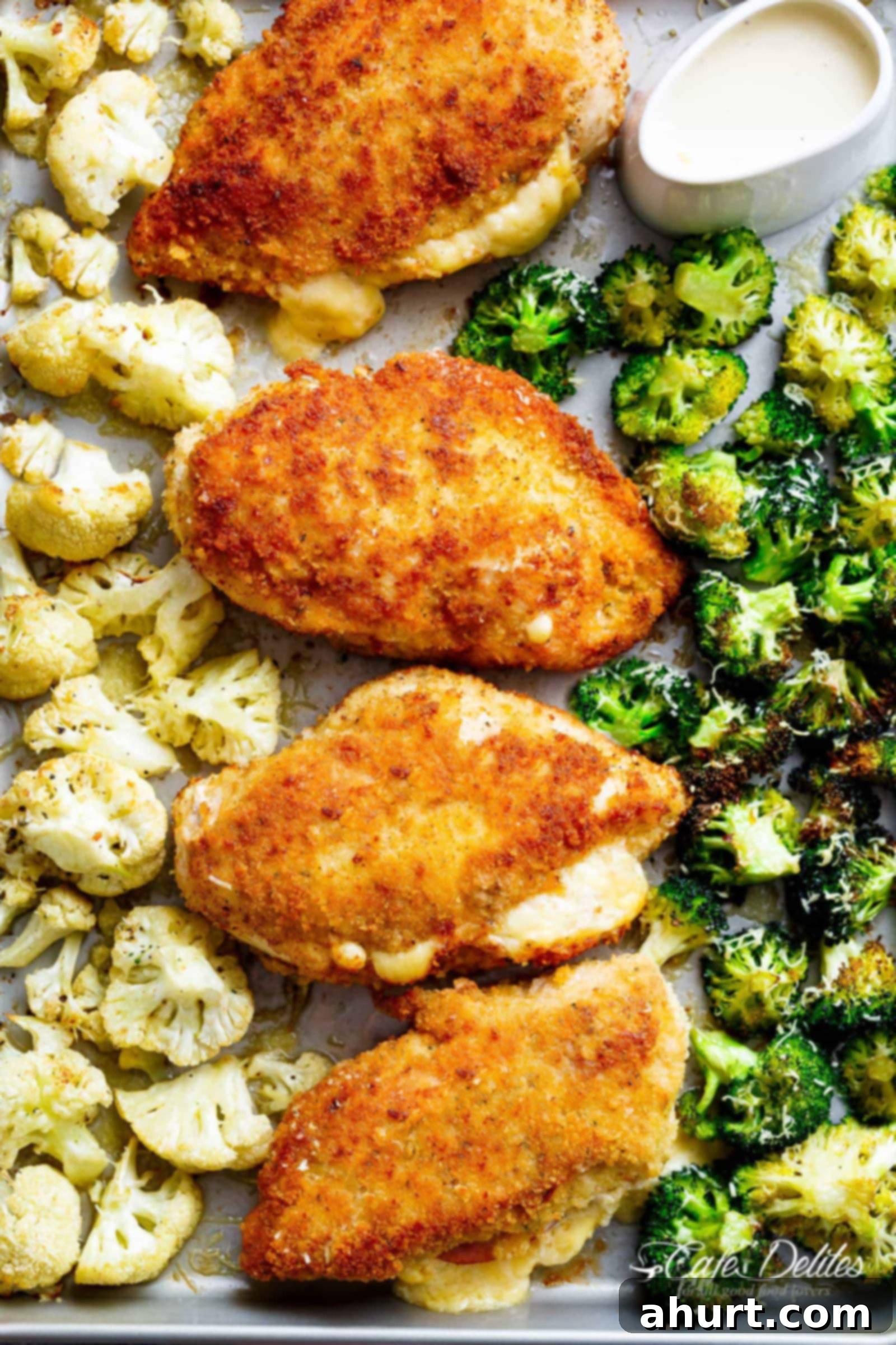 Fried chicken pieces with cauliflower and broccoli pieces