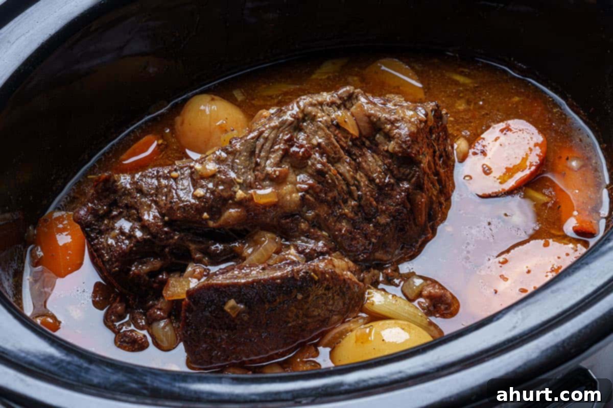 Melt In Your Mouth Pot Roast 8 The roast is now being tested, and adjustments to the seasoning are being made.