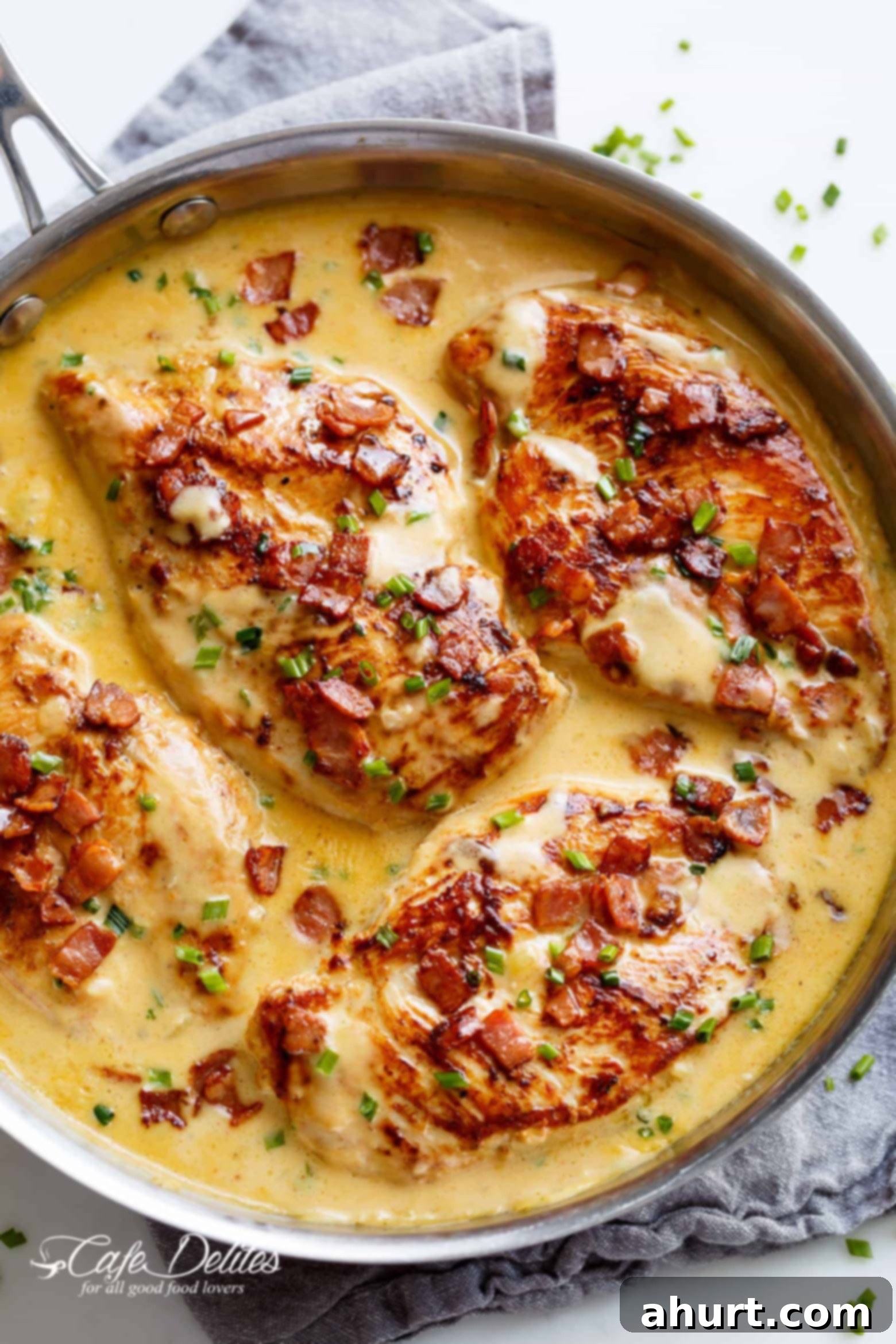 Top view of Creamy Beer Cheese Chicken With Crispy Bacon in a pan