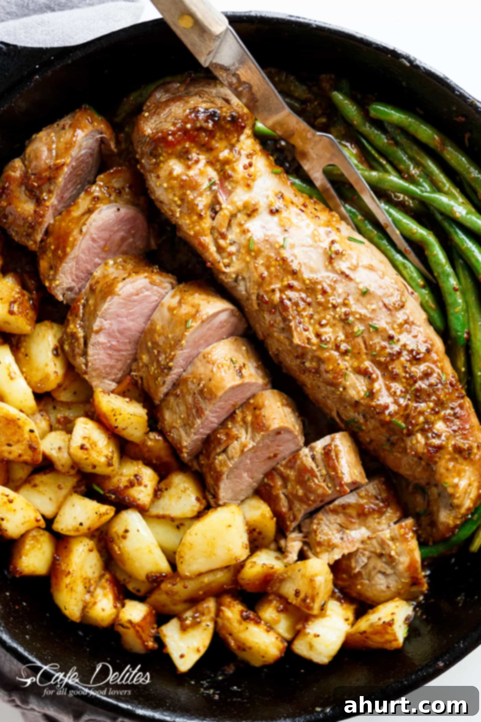 Dijon Pork Tenderloin 2 Dijon Garlic Pork Tenderloin & Veggies is a complete meal with crispy potatoes and tender green beans!