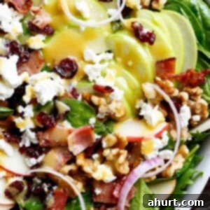 Honey Dijon Apple Bacon Cranberry Salad 8 Honey Dijon Apple Bacon Cranberry Salad screams Cranberries, Spinach, Walnuts And BACON! All drizzled with the most perfect Honey Dijon Dressing!