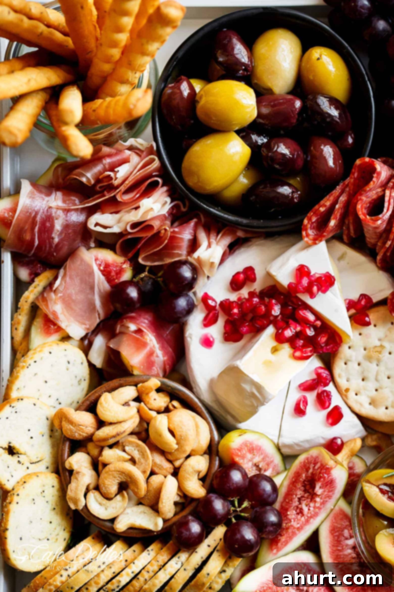 Thanksgiving Grazing Platter 3 A Loaded Thanksgiving Cheeseboard: An easy and quick charcuterie spread with zero skill and no prep work required, perfect for kicking off your holiday day or night!