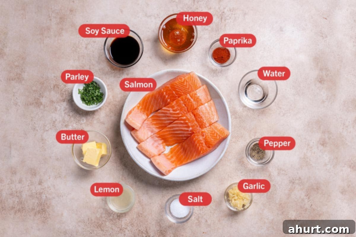 Glazed Honey Garlic Salmon 3 Image of the ingredients needed for the preparation of this recipe, specifically: salmon, soy sauce, honey, paprika, water, pepper, garlic, salt, lemon, butter, and parsely.