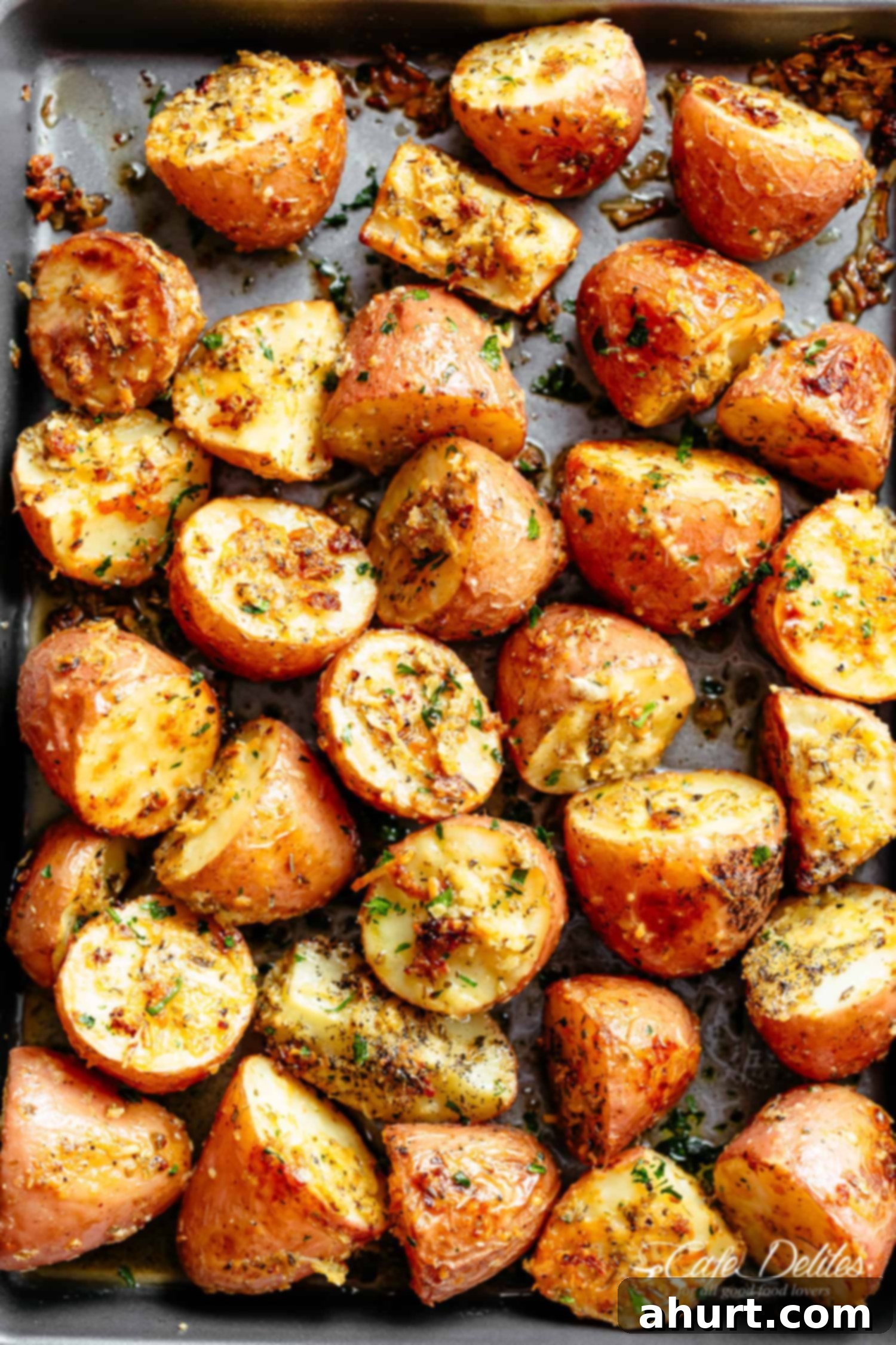 Crispy Browned Butter Parmesan Roasted Potatoes 2 Herbs, garlic, and parmesan cheese are roasted together to make the best Crispy Browned Butter Parmesan Roasted Potatoes!