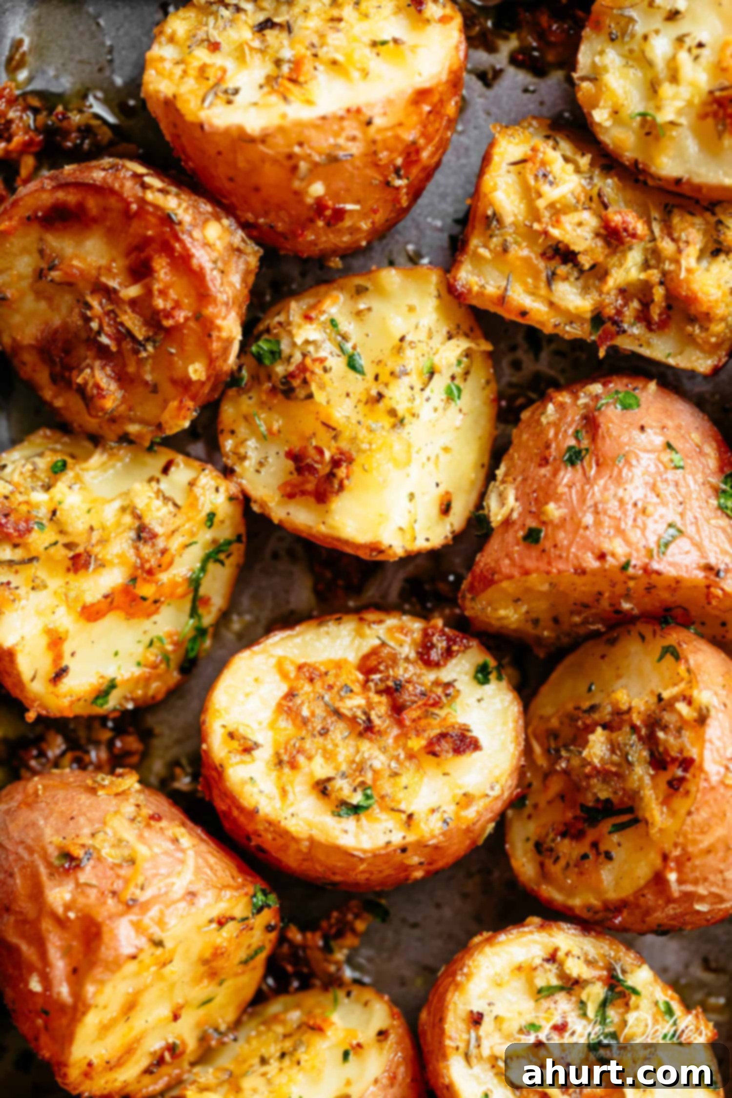 Crispy Browned Butter Parmesan Roasted Potatoes 5 Herbs, garlic, and parmesan cheese are roasted together to make the best Crispy Browned Butter Parmesan Roasted Potatoes!