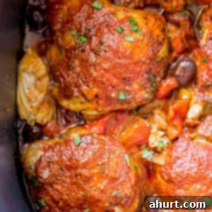 One Pot Mediterranean Chicken Dinner 2 Close up of Slow Cooker Mediterranean Chicken with olives and artichokes, ready to be served
