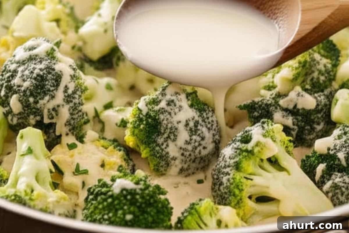 Creamy Broccoli and Bacon 9 Pouring in the cornstarch slurry.
