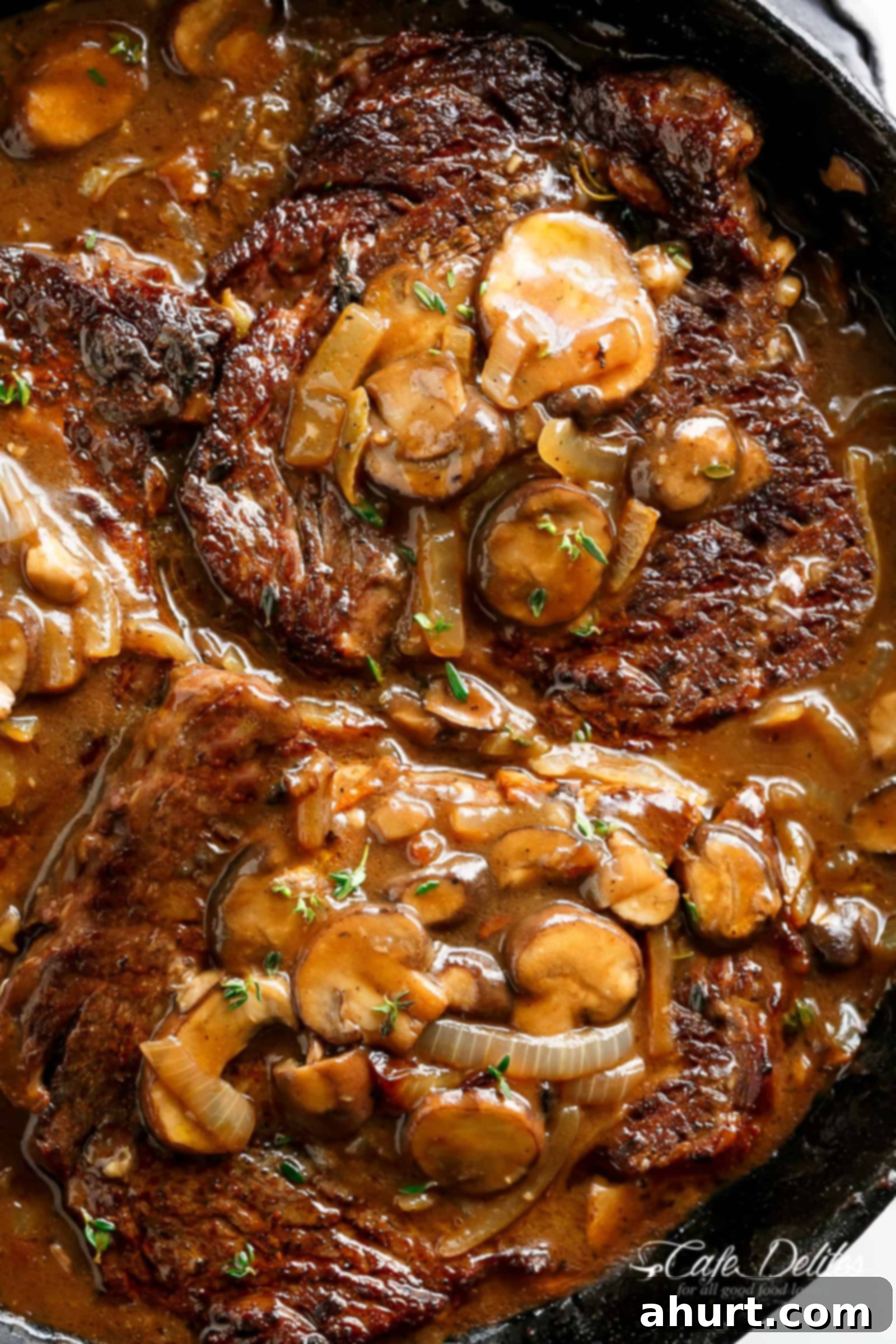 Savory Steaks with Velvety Mushroom Gravy 12 Zoom in image of Ribeye Steaks With Mushroom Gravy
