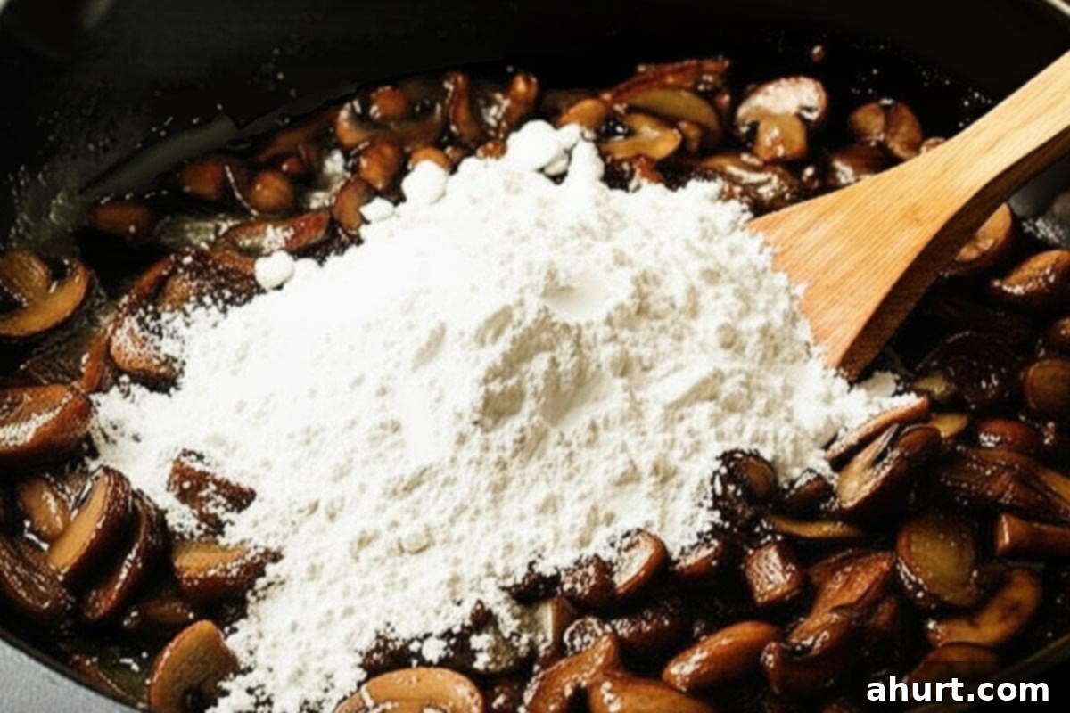 Savory Steaks with Velvety Mushroom Gravy 8 Flour and mushroom in a skillet.
