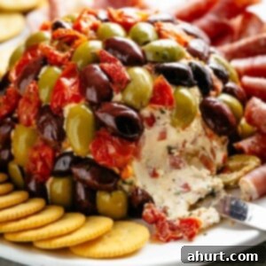 Irresistible Cheese Ball Antipasto 3 Antipasto-Cheeseball on a plate