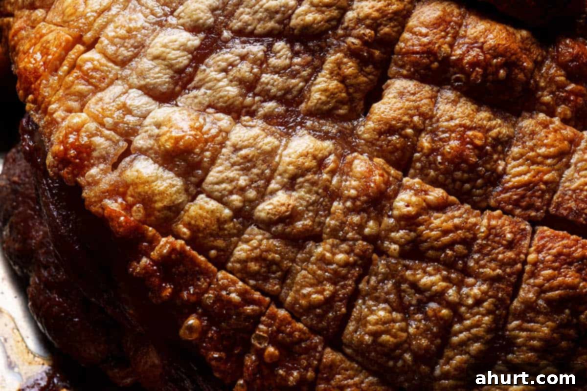 Golden Crackle Pork Roast 7 Pork roast with fully golden and crispy crackling, just removed from the oven.