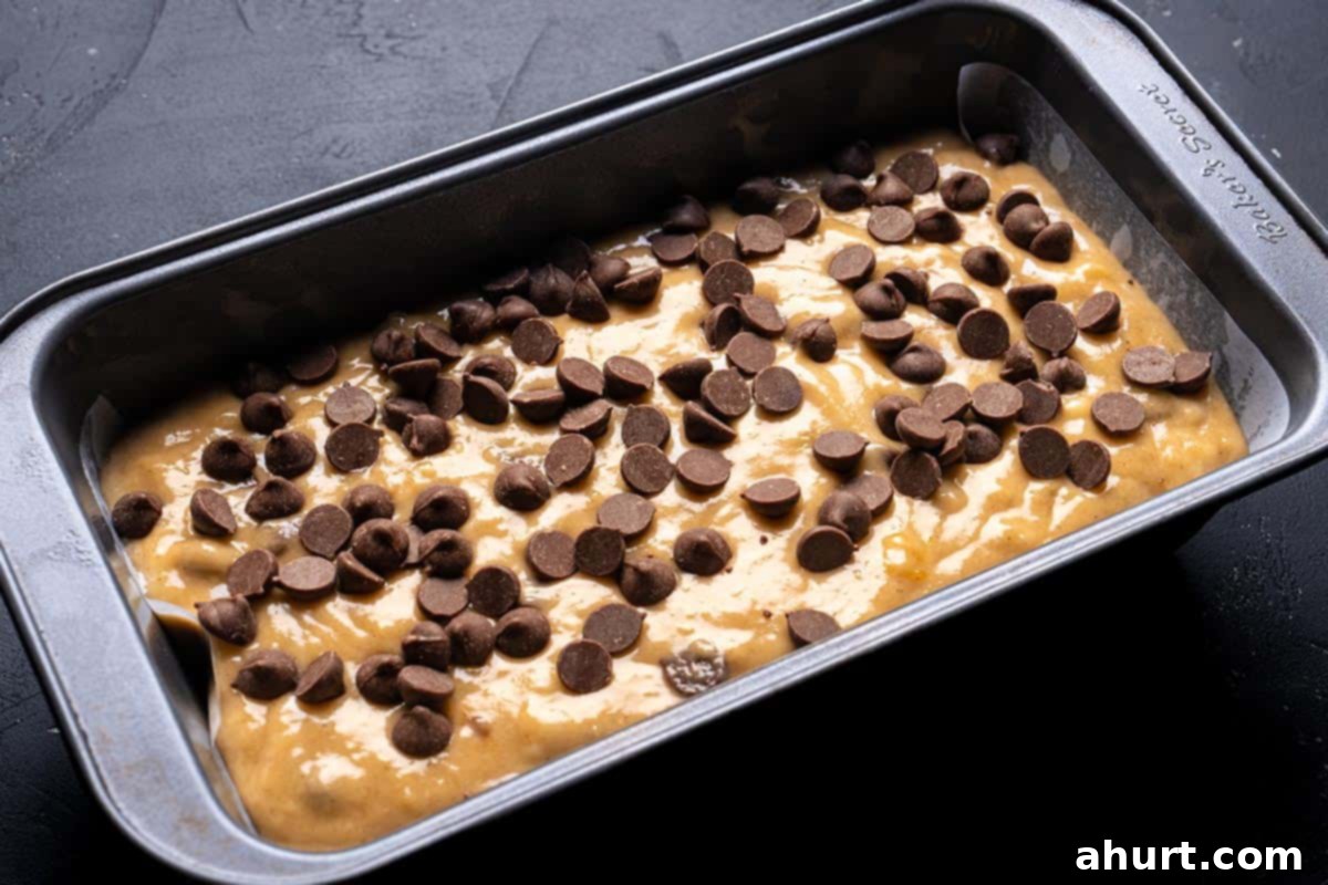 The Ultimate Chocolate Chip Banana Bread 8 uncooked banana bread topped with chocolate chips