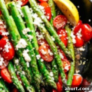 Effortless Lemon Garlic Asparagus 10 Lemon Garlic Asparagus topped feta cheese, tomatoes and drizzled with Mediterranean flavours