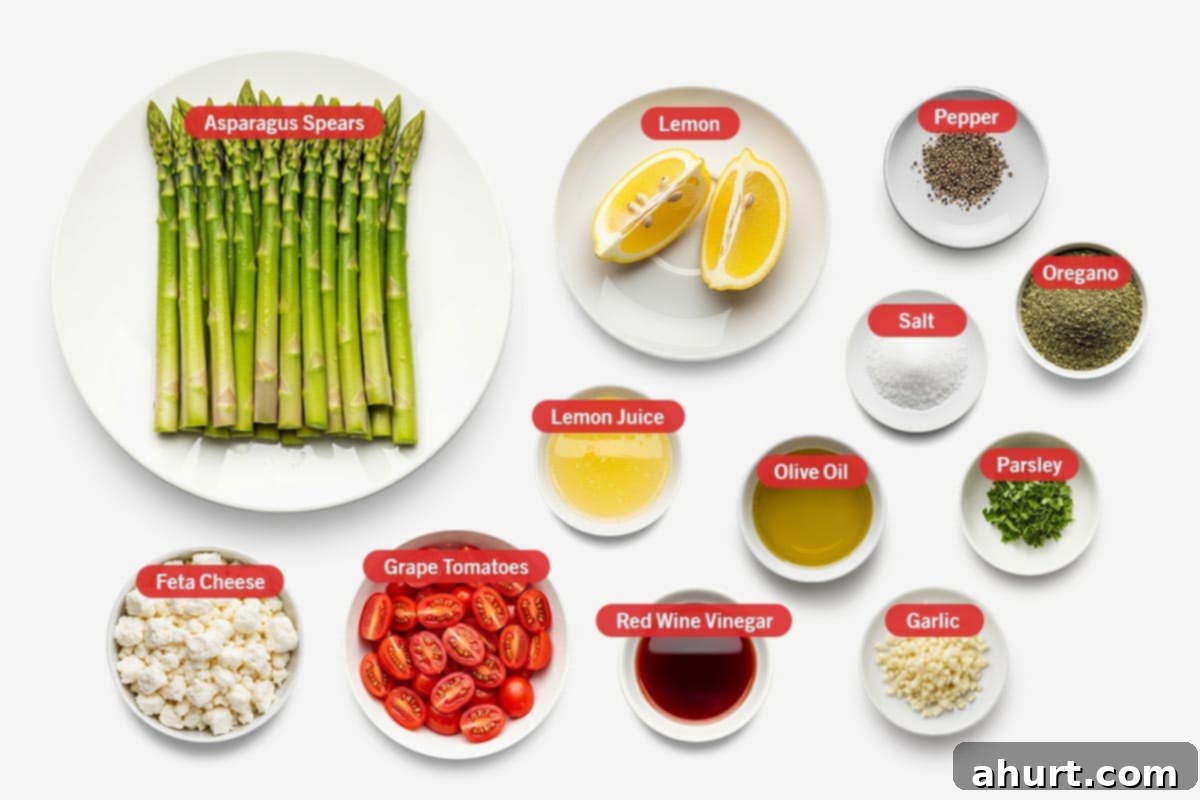 Effortless Lemon Garlic Asparagus 2 Top shot of ingredients: Asparagus Spears, lemon, pepper, salt, oregano, lemon juice, olive oil, parsley, feta cheese, grape tomatoes, red wine vinegar, and garlic.
