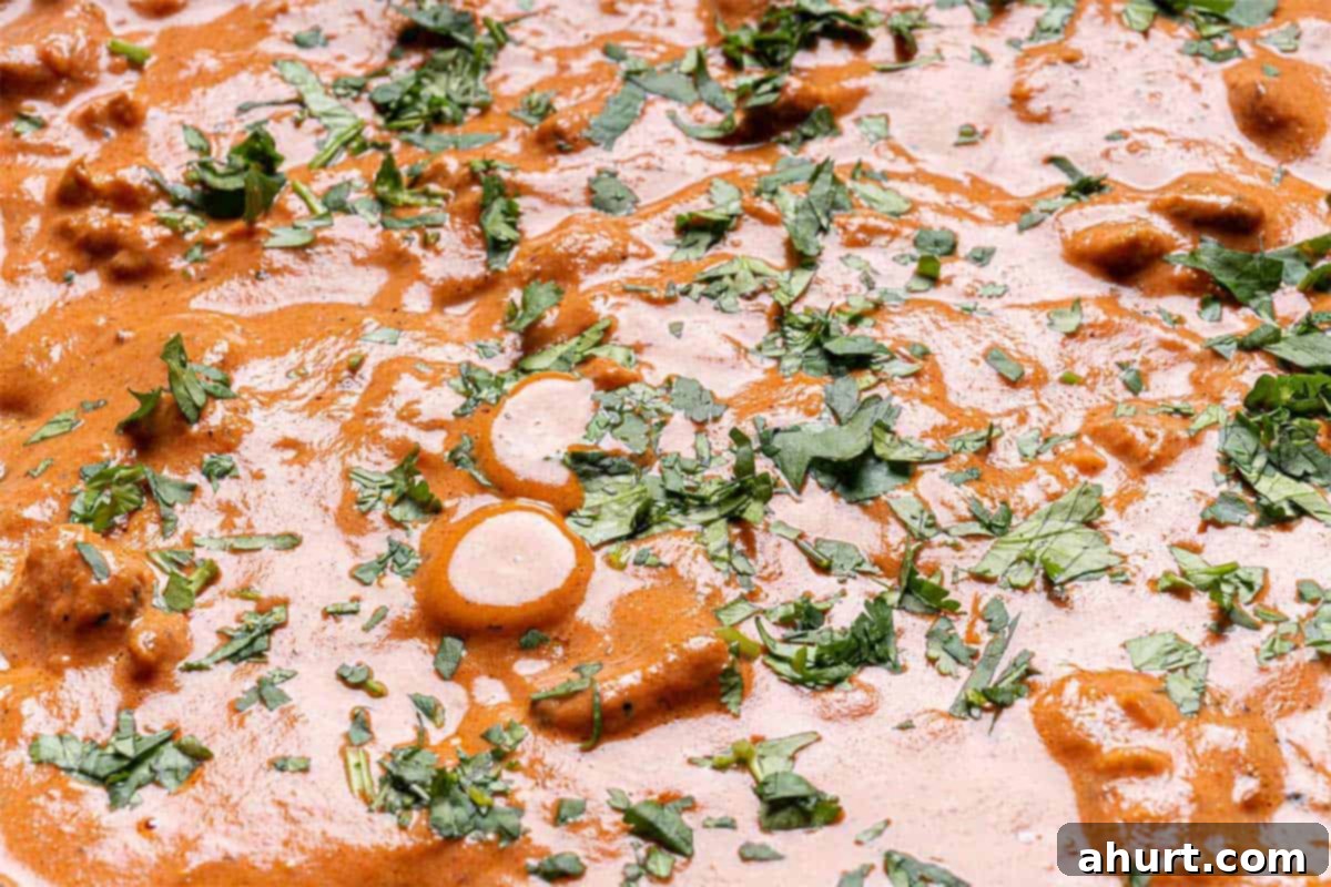 Rich and Creamy Chicken Tikka Masala 9 finished tikka masala garnished with fresh parsley