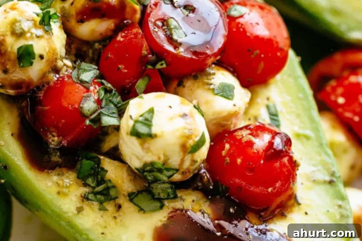 Caprese Avocado Boats 4 Arrange avocado halves on a plate and spoon the Caprese mixture into each. Drizzle with balsamic glaze, sprinkle with chopped basil, and serve.