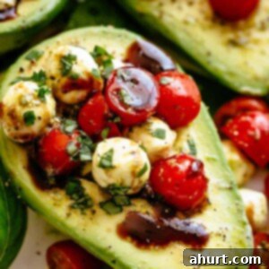 Caprese Avocado Boats 5 Basil Pesto Caprese Stuffed Avocado drizzled with balsamic glaze make an incredible light lunch or snack! Take creamy avocados to a different level! Sweet and juicy grape/cherry tomatoes with fresh mozzarella balls are tossed through basil pesto and spooned into avocado halves!