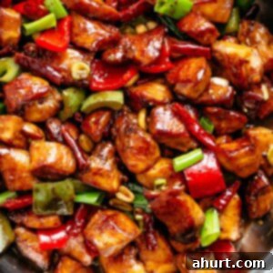 Kung Pao Chicken 11 Kung Pao Chicken is highly addictive stir-fried chicken with the perfect combination of salty, sweet and spicy flavour! Make it better than Chinese take out right at home! With crisp-tender chicken pieces and some crunchy veggies thrown in, this is one Kung Pao chicken recipe hard to pass up