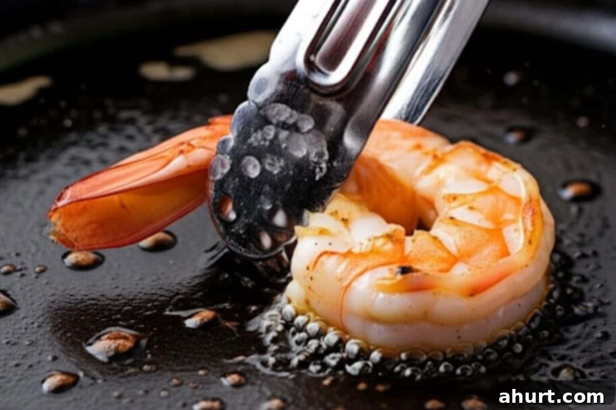 Fiery Shrimp Fajitas 6 Add the shrimp into the pan and cook for 2 minutes.