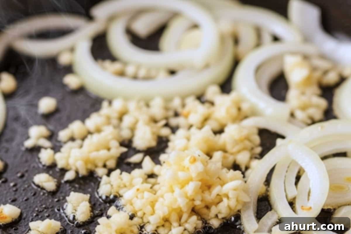 Fiery Shrimp Fajitas 7 saute the onions and garlic until fragrant.