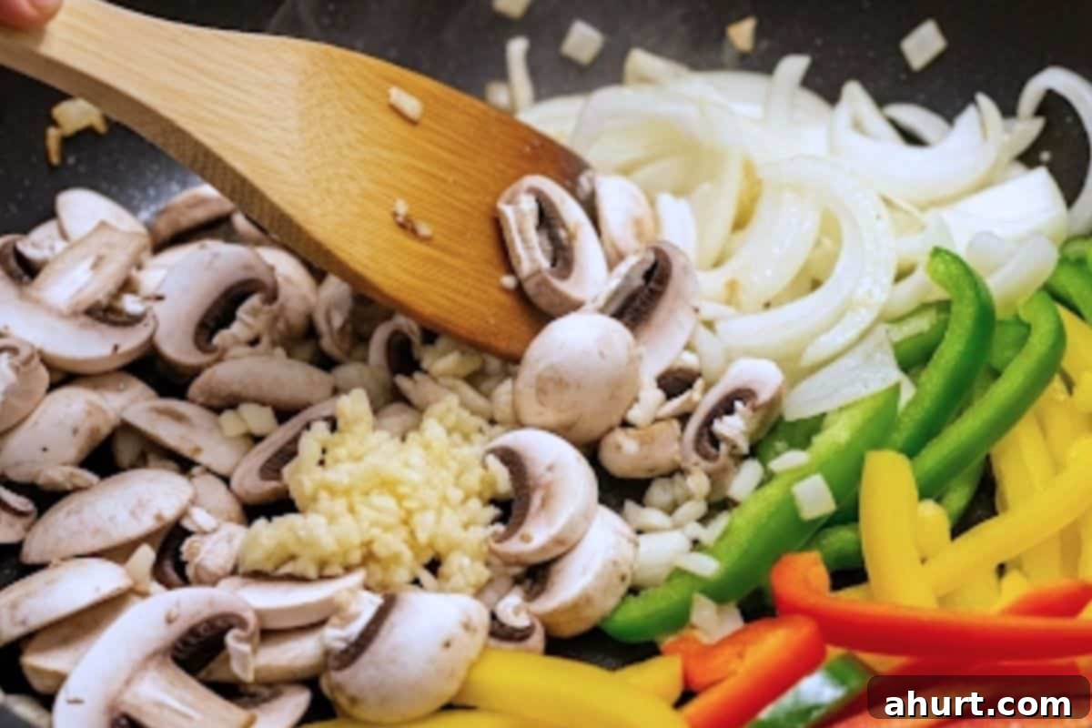 Fiery Shrimp Fajitas 9 Add the sliced bell peppers and cooked until tender-crisp