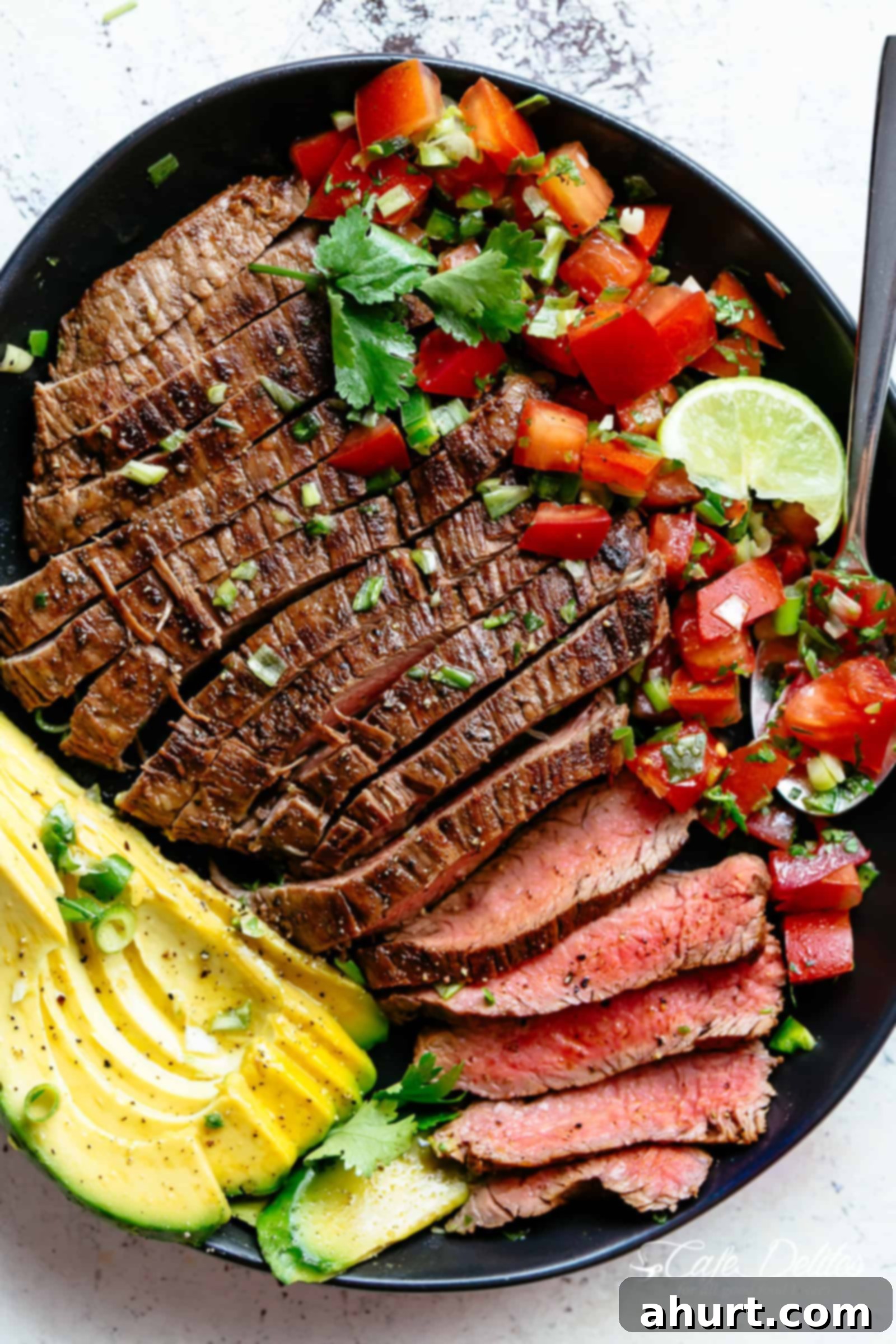 Carne Asada with avocado and Pico De Gallo | cafedelites.com Carne Asada prepared with a deliciously easy and authentic marinade just in time for your Cinco De Mayo