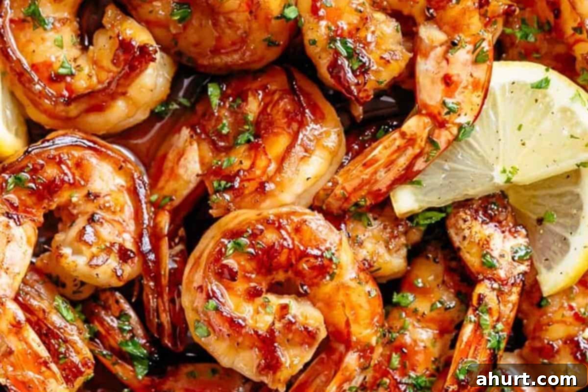 Honey Garlic Shrimp 9 Season the cooked shrimps with salt and pepper. Garnish with parsley and serve with lemon slices.