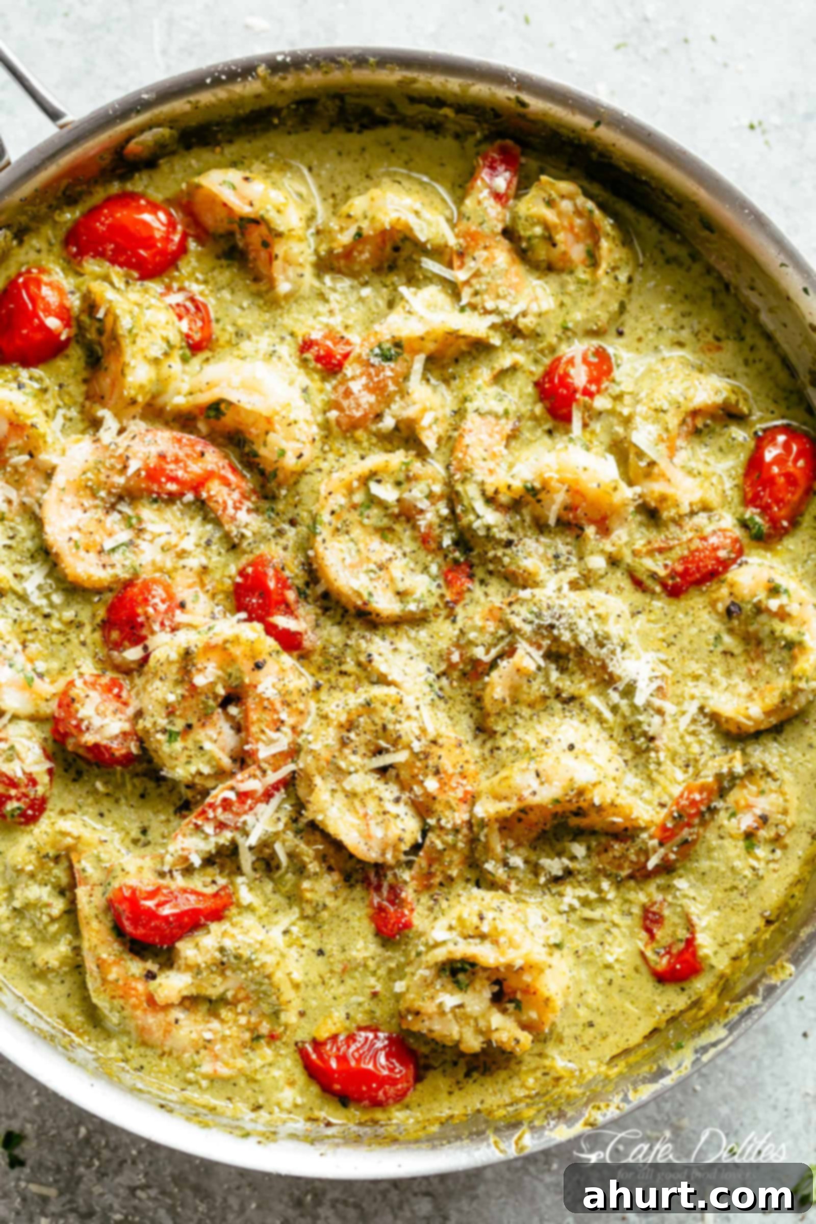 Creamy Pesto Shrimp Alfredo | cafedelites.com Creamy Pesto Shrimp Alfredo with parmesan cheese and blistered tomatoes is the shrimp recipe of your dreams! Ready in less than 10 minutes, gluten free AND low carb! Serve over zucchini noodles or cauliflower rice
