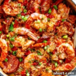 Soulful Creole Jambalaya 12 An authentic Creole Jambalaya recipe! A delicious one-pot meal coming to you from New Orleans is pure comfort food filled to the brim with chicken, shrimp, andouille sausage, rice, seasonings, spices and incredible flavours! Ready and on the table in 45 minutes!