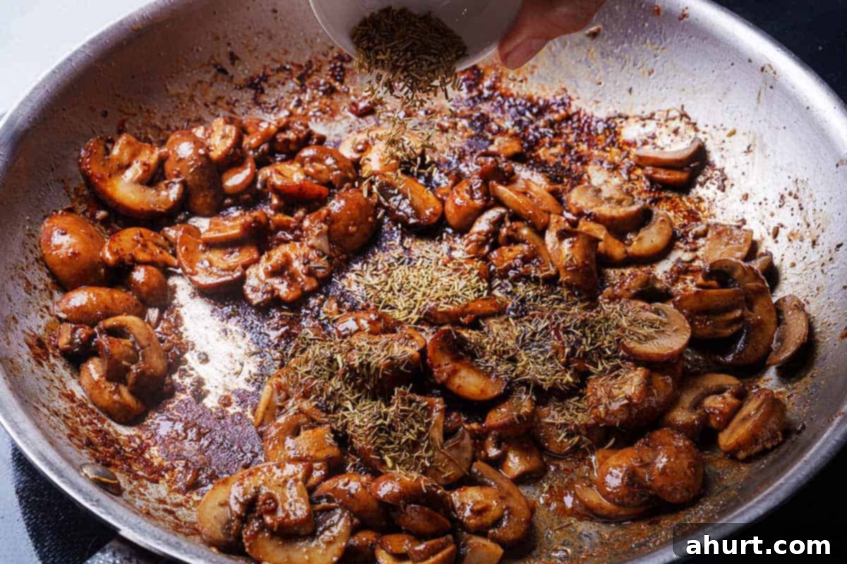Creamy Mushroom Garlic Chicken Thighs 7 Mushrooms are tossed in a pan and sauted