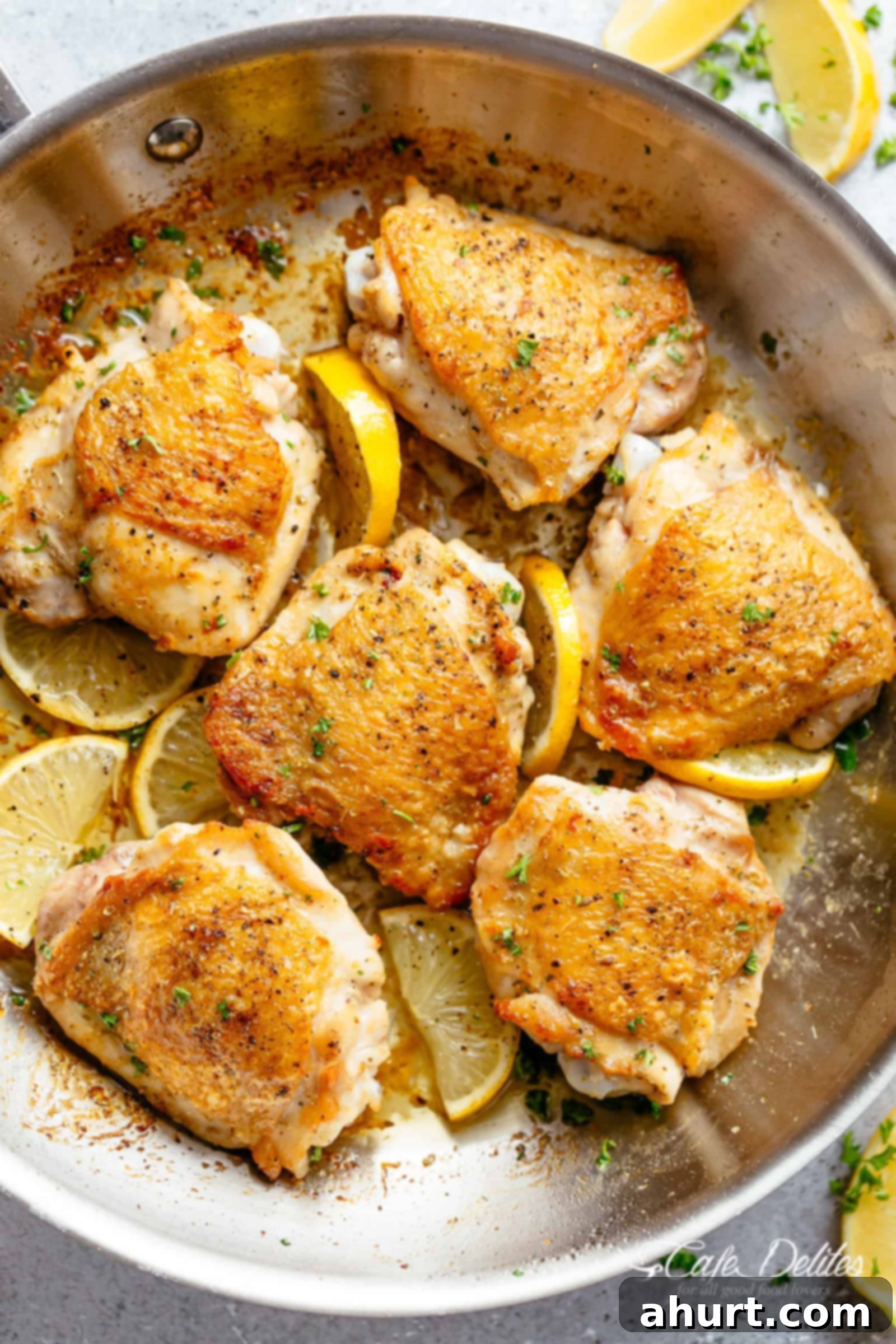 Lemon Chicken | cafedelites.com Roast Lemon Chicken thighs with crispy skin pan, seared then oven baked for tender and juicy chicken full of flavour in a pan