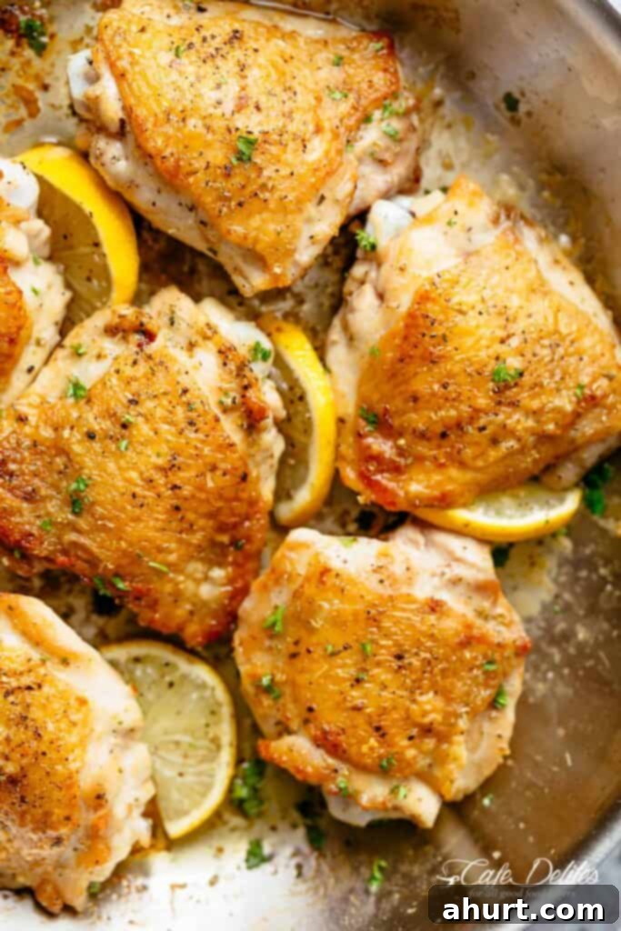 Golden Lemon Chicken 7 Roasted Lemon Chicken thighs with crispy skin pan, seared then oven baked for tender and juicy chicken full of flavour!
